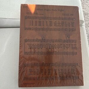 Wooden plaque song